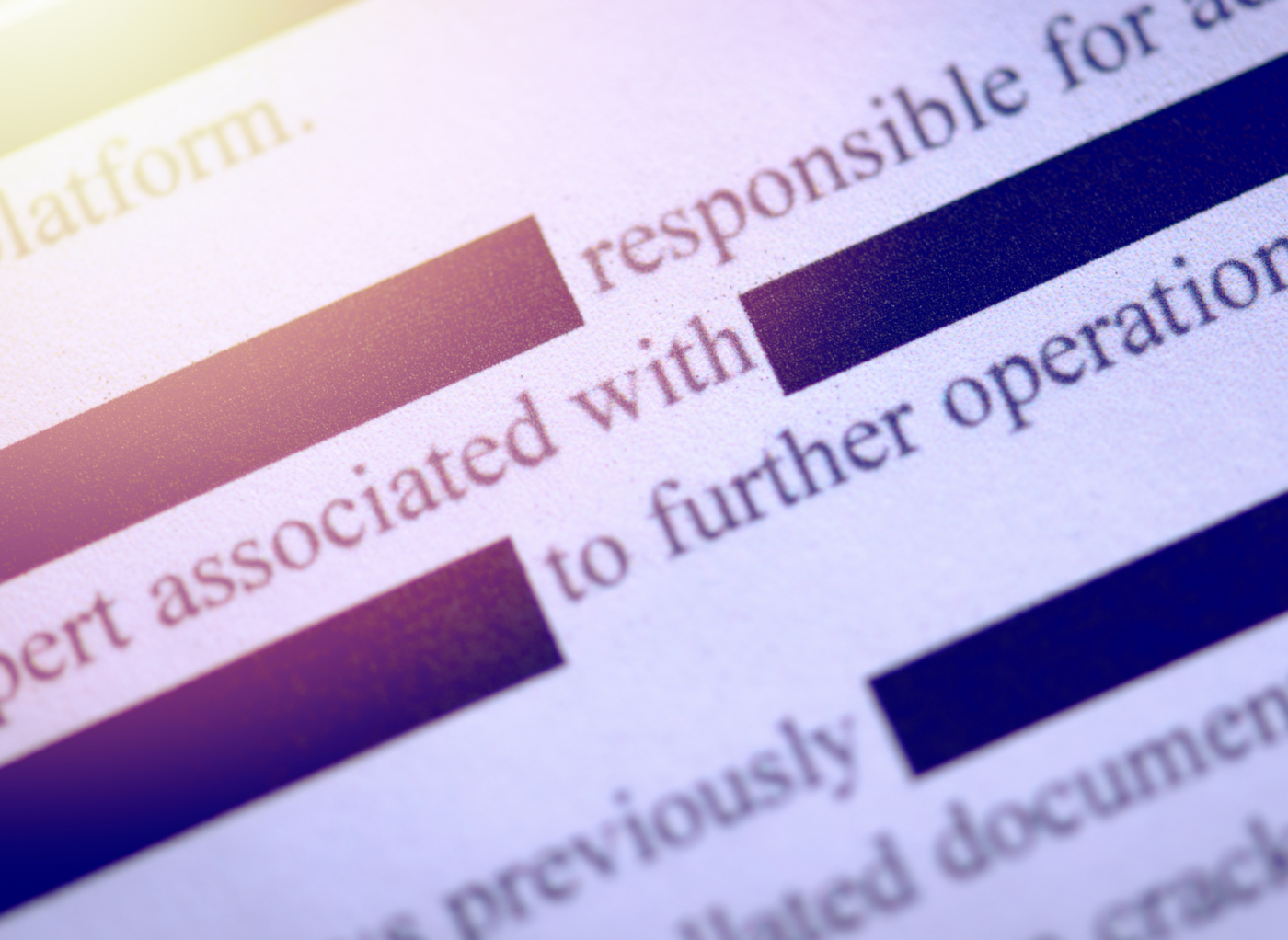 close-up photo of a redacted document