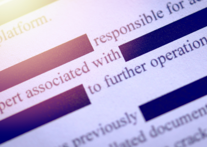 close-up photo of a redacted document